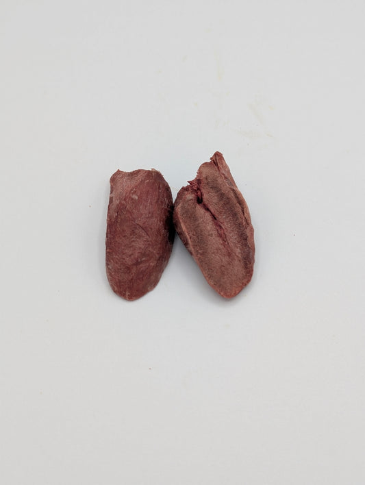 A raw halved, freeze dried, goose heart